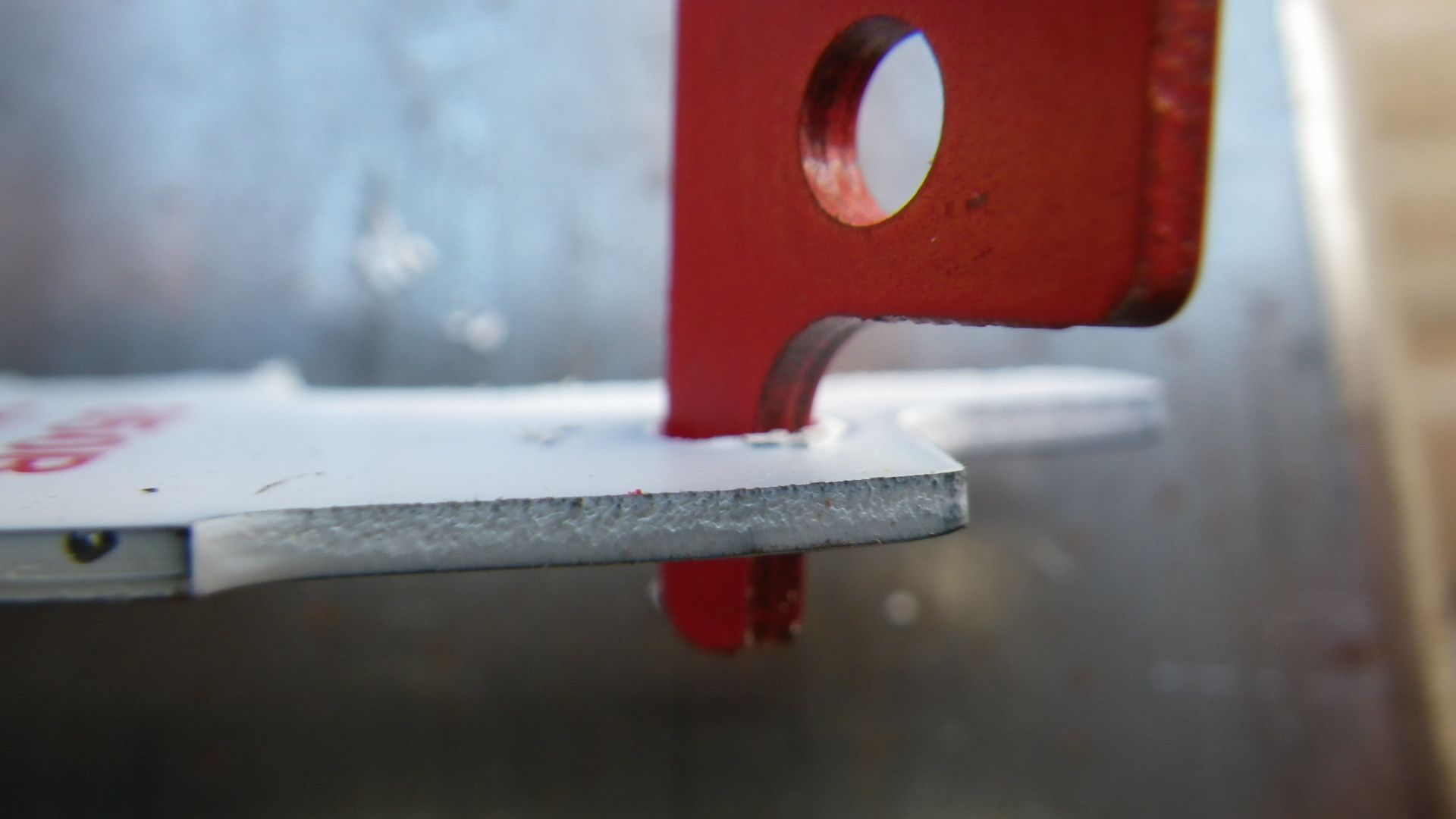 Cleaning out extra paint with the “tail”