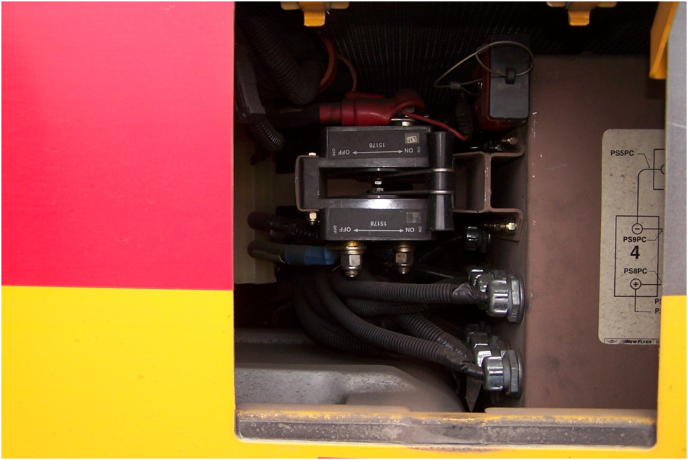 Low-voltage disconnect switch on a New Flyer bus installed upside-down